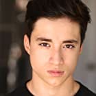 Elijah Rodriguez به عنوان Miguel Hernandez
