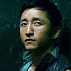 Shiming Zou به عنوان Elevator Boxer