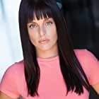 Kelsey Johnson به عنوان Raquel
