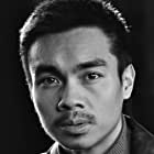 Alan Trong به عنوان Larry