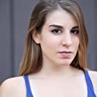 Kristin McGuire به عنوان Additional Voices