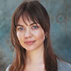 Sarah Twomey به عنوان Police Officer Frieda